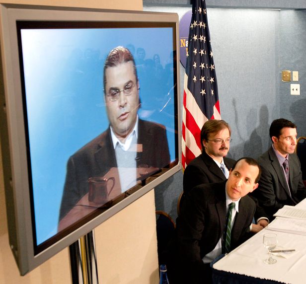 Plaintiff Masri (on the screen) on lawyers at a press conference in Washington, D.C., in 2005