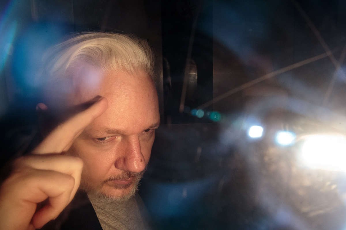 Wikileaks Founder Julian Assange leaves Southwark Crown Court in a security van on May 1, 2019, in London, England.