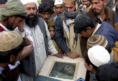Pakistanis mourn a man killed in a U.S. drone attack along the Afghanistan border, 2010. (Photo: AP)