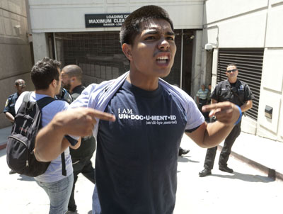 Los Angeles, August 2011. Protestor blocking an entrance to the United States Immigration Customs Enforcement (ICE) offices.