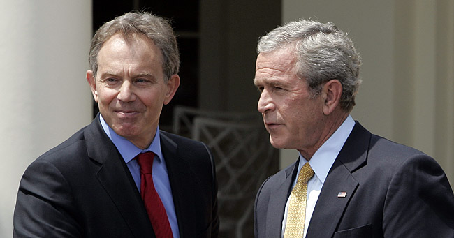 President Bush and British Prime Minister Tony Blair talk outside of the Oval Office, Thursday, May 17, 2007, at the White House in Washington. (AP Photo/Ron Edmonds)