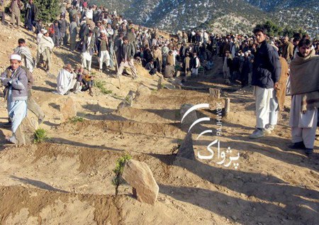 Villagers digging graves for the dead